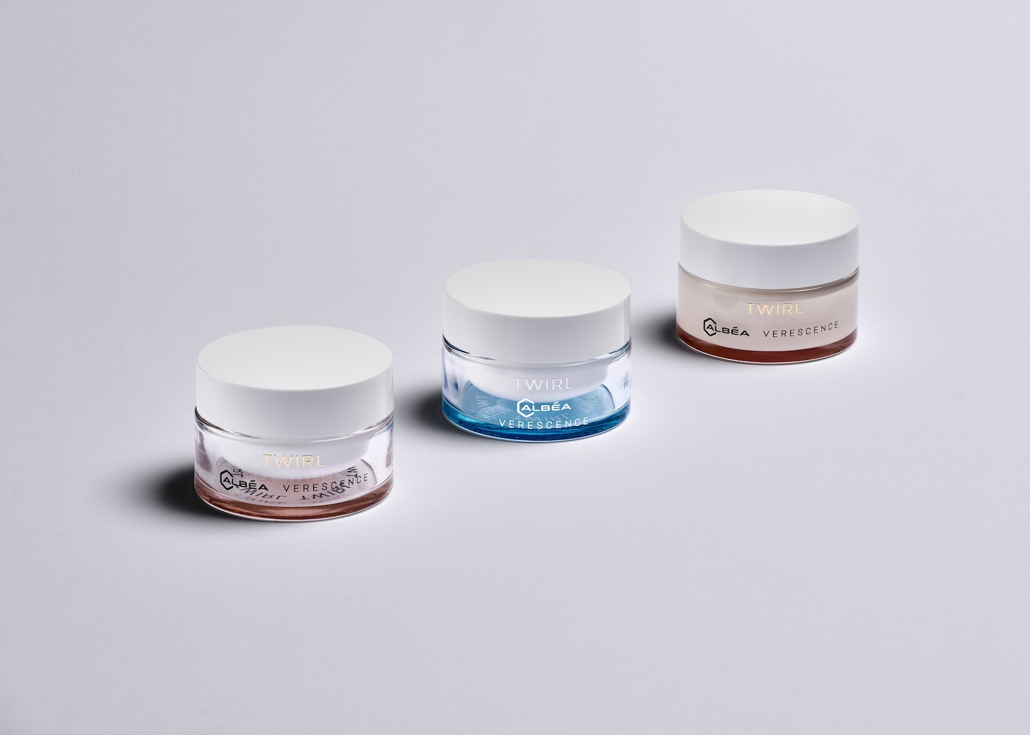 Cosmetic jars with glass base and white lids made of Sulapac material
