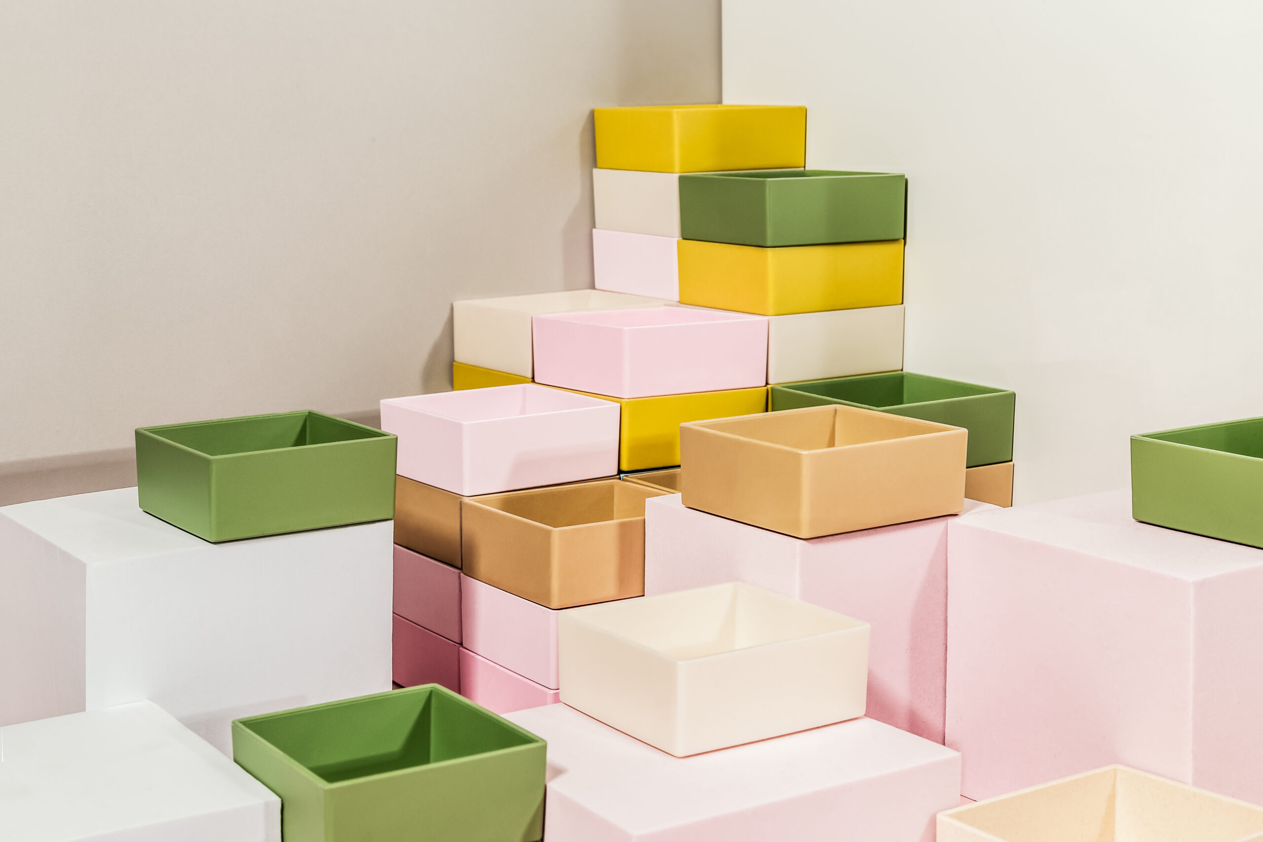 Sulapac Solid Packaging in different colors piled